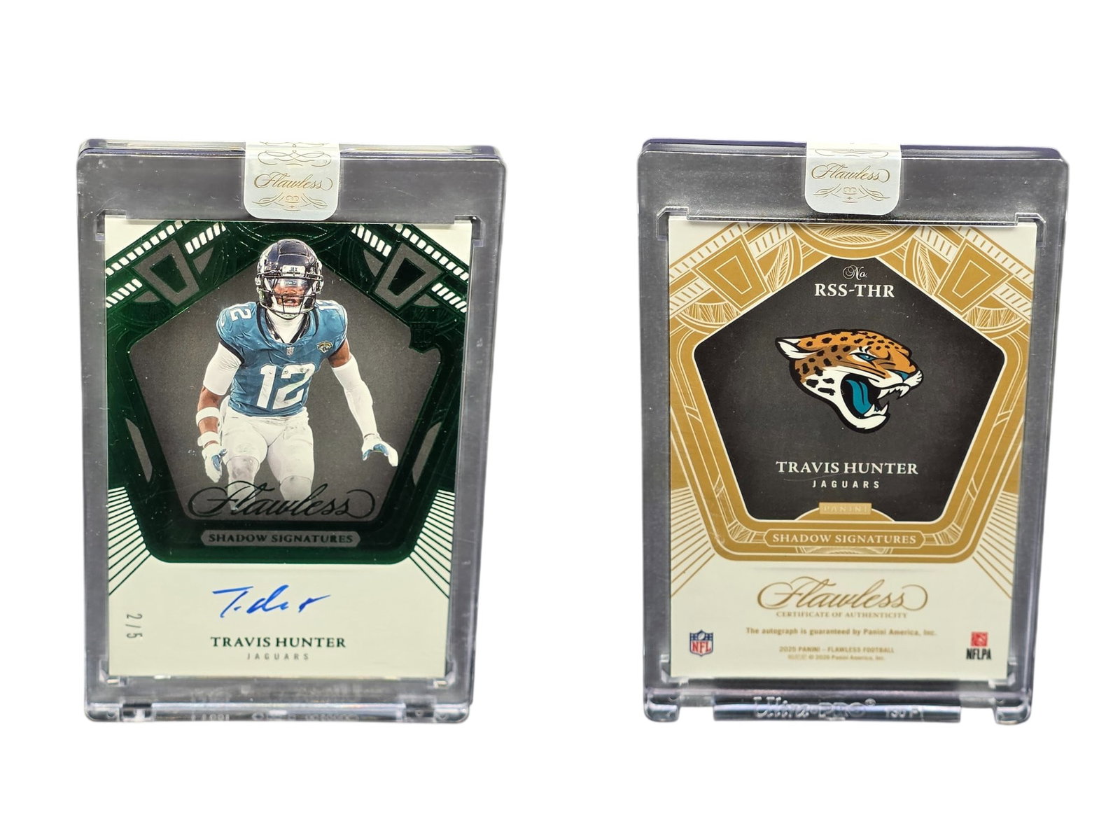 2025 PANINI FLAWLESS FOOTBALL TRAVIS HUNTER #RSS-THR SHADOW SIGNATURES ROOKIE AUTO /5 JAGUARS: This generational sports card grail features dual-threat phenom and Heisman Trophy winner Travis Hunter from the pinnacle 2025 Panini Flawless Football release. Combining a stunning on-card rookie aut
