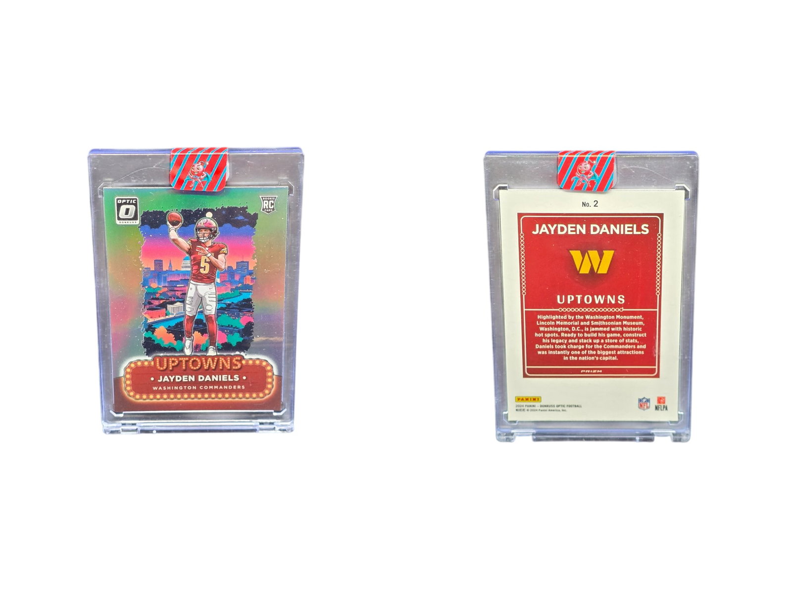 2024 PANINI DONRUSS OPTIC FOOTBALL JAYDEN DANIELS #2 UPTOWNS ROOKIE COMMANDERS: This 2024 Panini Donruss Optic "Uptowns" rookie card features superstar quarterback Jayden Daniels. Widely considered a highly coveted, super short-printed (SSP) insert, this striking piece highlights