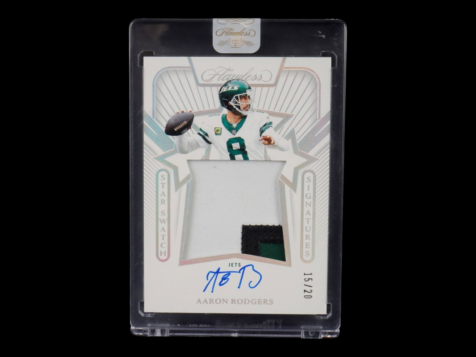 2025 FLAWLESS AARON RODGERS STAR SWATCH SIGNATURES /20: This elite 2025 Panini Flawless card features the on-card signature of future Hall of Fame quarterback Aaron Rodgers, appearing in his New York Jets uniform. Hailing from the prestigious "Star Swatch 