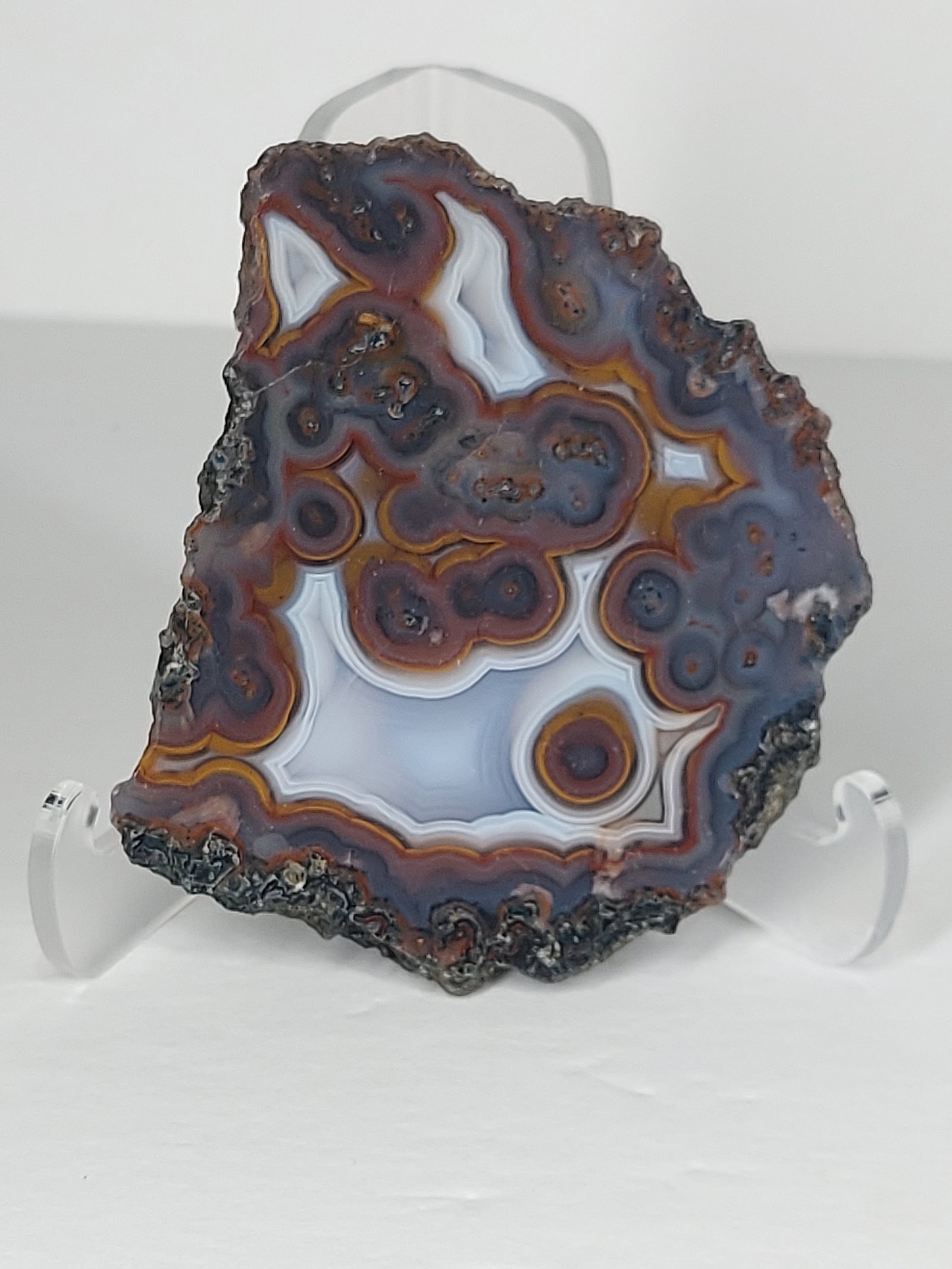 Turkish Banded Agate: Turkish Banded Agate Face-Polished Nodule/Chunk This natural Turkish banded agate features a beautifully face-polished surface showcasing striking fortification banding and distinctive orbicular ("eye
