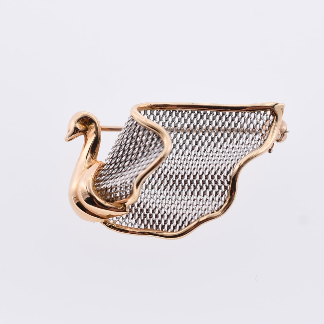Italian Gold & Platinum Swan Brooch: 18k Yellow Gold & Platinum | Approximate Dimensions: 1 1/4" W x 3/4 T | Approximate Weight: 3.6g |