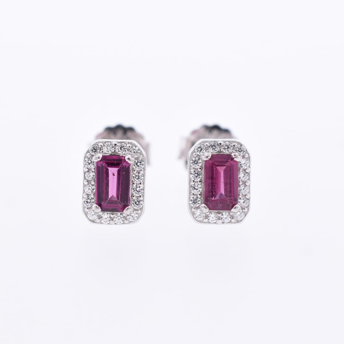 Elongated Rhodolite Garnet Stud Earrings: Sterling Silver | Approximate Dimensions: 1/2" T | Approximate Weight: 1.3g | Stones have been verified to be natural.