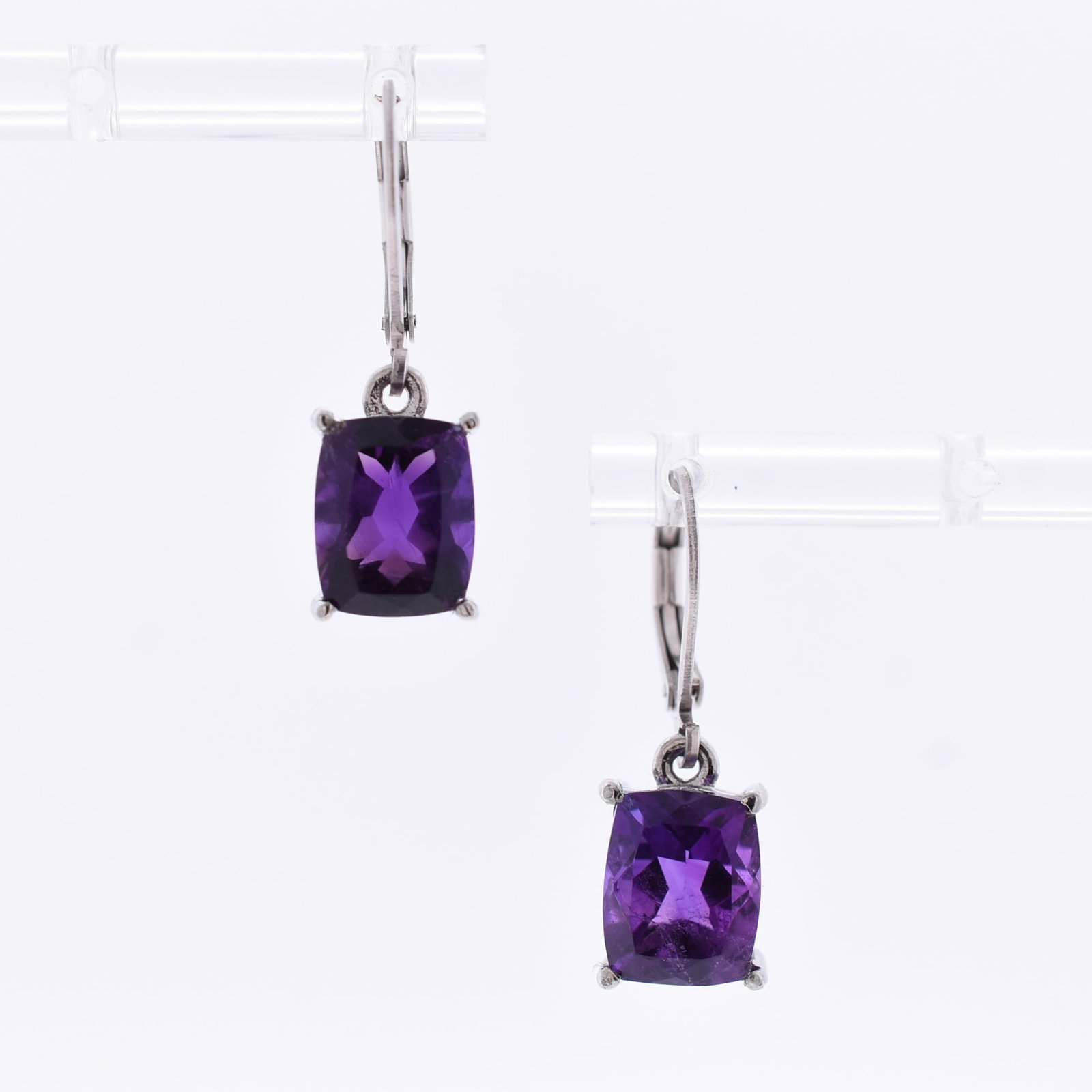 Elongated Amethyst Dangle Earrings: Sterling Silver | Approximate Dimensions: 1" T | Approximate Weight: 3.0g | Stones appear to be natural, and are estimated to way approximately 5.3ctw.