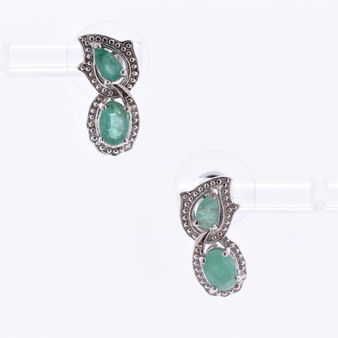 Dual Emerald Stud Earrings: Sterling Silver | Approximate Dimensions: 1/2" W x 5/8" T | Approximate Weight: 3.1g | Stones have been verified as natural.