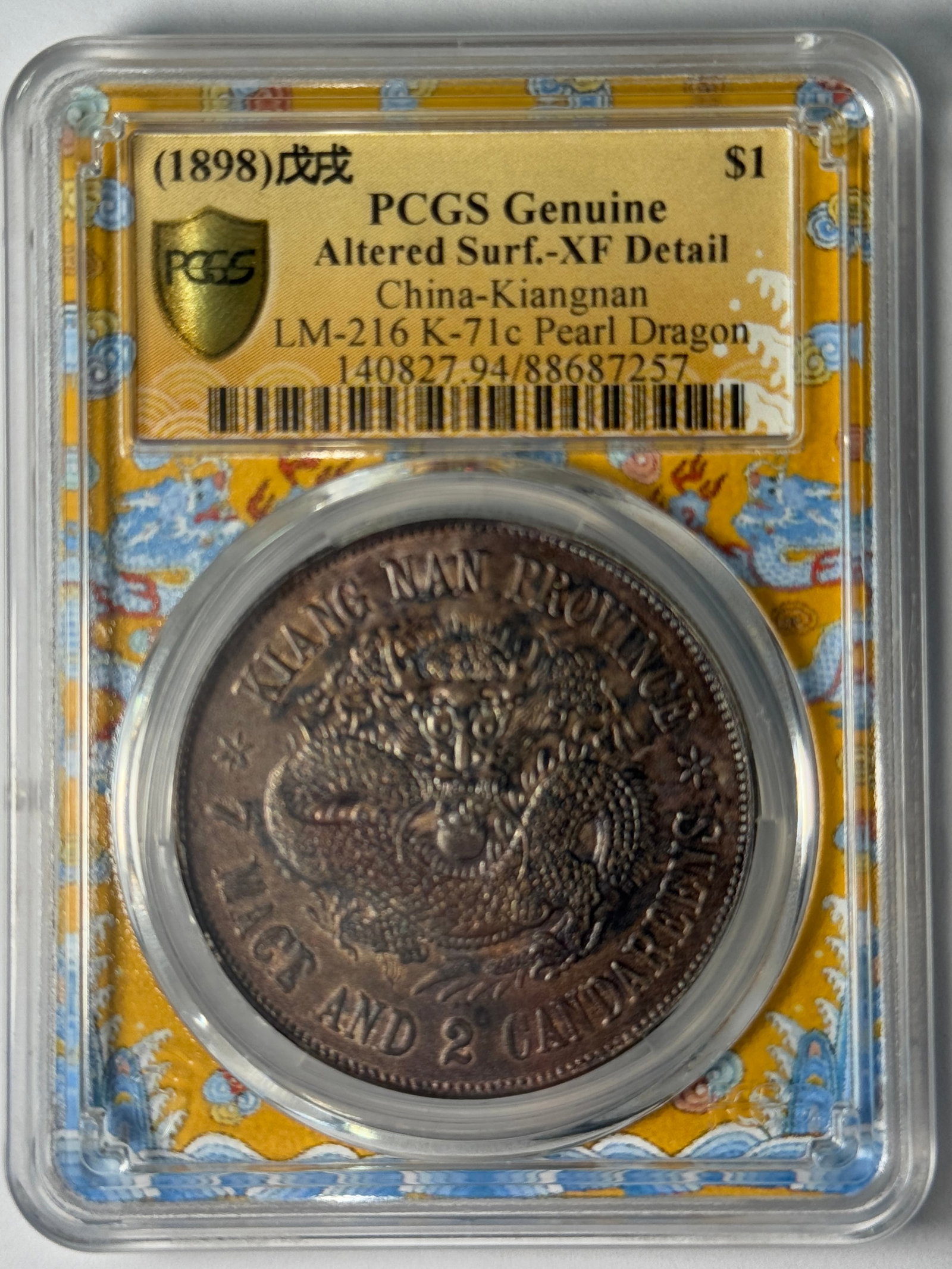 (1898) PCGS Genuine Altered Surf.-XF Detail China-Kiangnan LM-216 K-71c Pearl Dragon: Kiangnan Province (1898) silver dollar, Pearl Dragon variety. Obverse: KIANG NAN PROVINCE / 7 MACE AND 2 CANDAREENS, coiled dragon with pearl. Reverse: Kuang Hsu dollar of Kiangnan mint. PCGS Genuine 