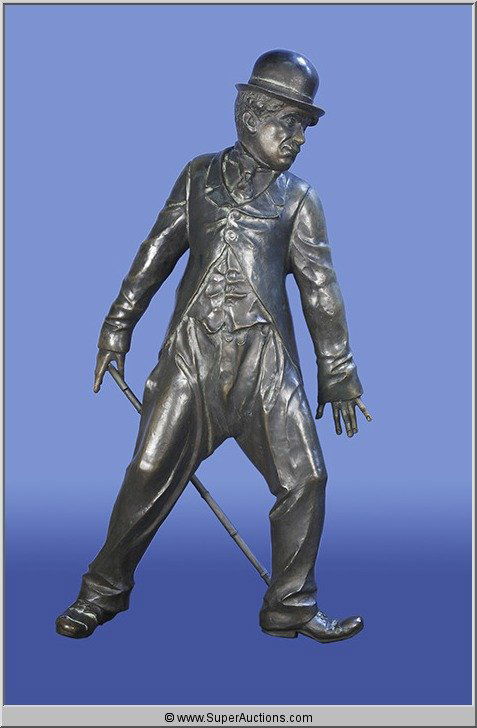 Bronze Statue of Charlie Chaplin "The Little Tramp": A life-size Bronze Statue of Charlie Chaplin as "The Little Tramp" created by Emmanuil Snitkovsky. This Charlie Chaplin statue represents the mischievous side of Chaplin's immortal screen character wh