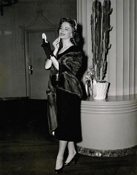 Natalie Wood Negatives and Photographs: Natalie Wood from The Max Factor Collection / (2) 4 x 7 Negatives of Natalie Wood Applying Cream Puff Make-Up in Max Factor Salon and (1) 3 1/2 x 4 1/2 Black & White Photograph / (1) 4 x 7 Negative of