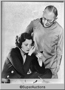 Sylvia Sidney Negative: Sylvia Sidney from The Max Factor Collection / (1) 8 x 10 Nitrate Negative of Sylvia Sidney Applying Eyelash Make-Up with Max Factor Beside Her