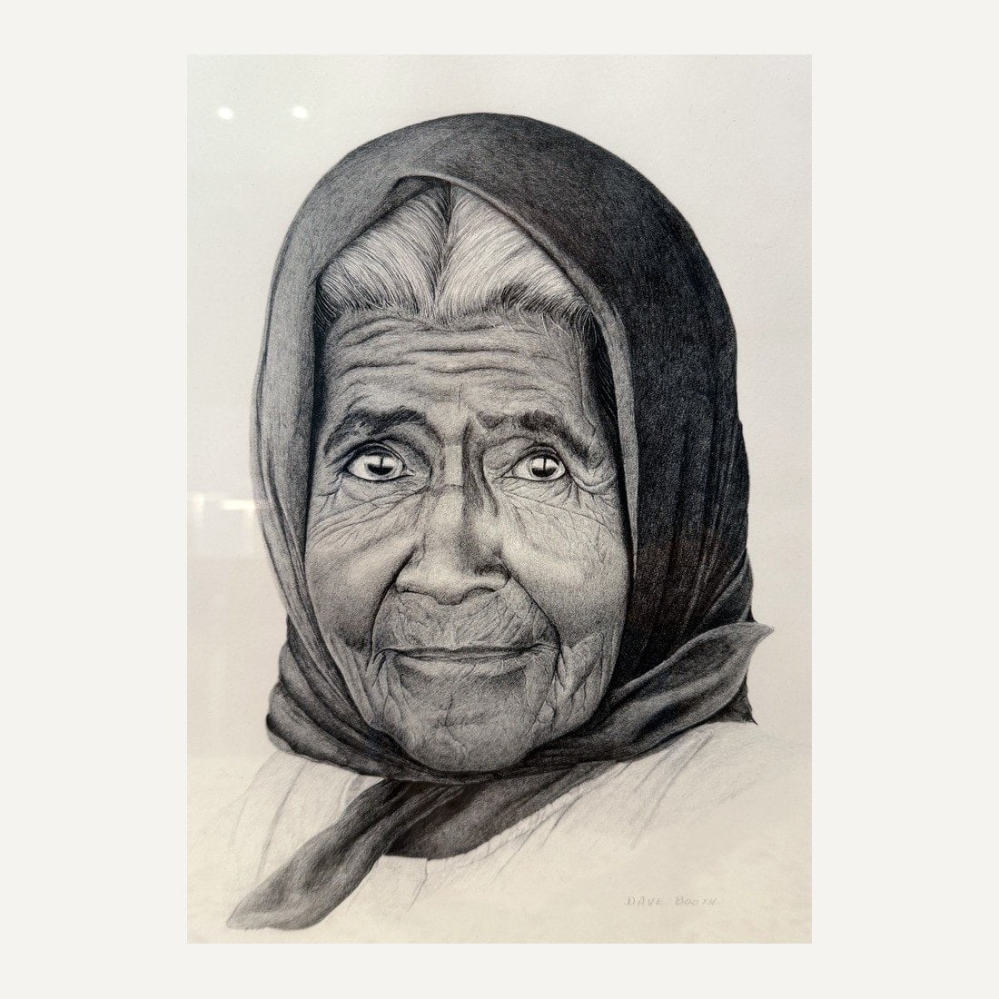 Dave Booth Graphite Portrait, Woman in Headscarf: Signed Original Drawing, Framed, Southwestern School An original signed graphite portrait drawing of an elderly woman in a knotted headscarf, rendered with extraordinary patience in fine pencil on