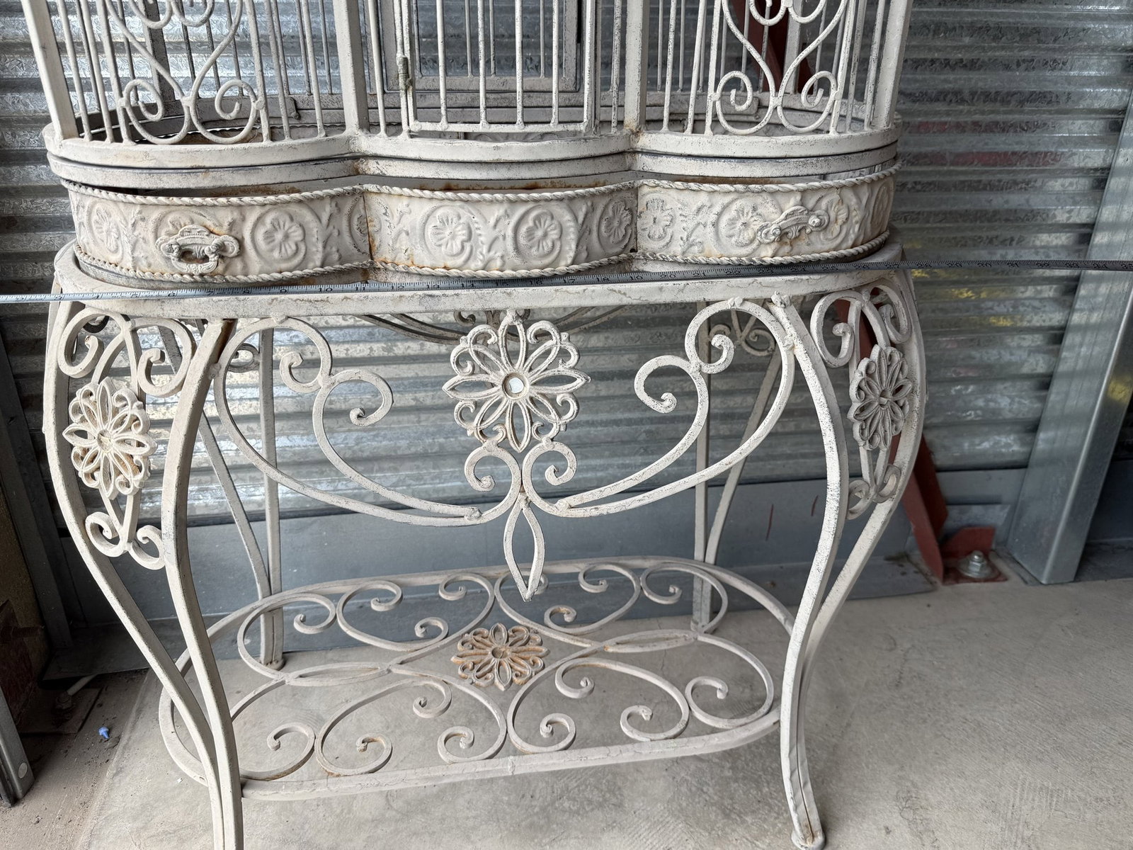 Victorian-Style Wrought Iron Birdcage on Stand: Nearly 6 Ft Tall, Antique White Finish, Scrolled Cabriole Base, Rosette Medallions A large decorative Victorian-style birdcage on its original matching iron stand, finished in a distressed antique whi
