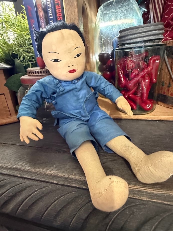 Ada Lum Attributed Chinese Cloth Doll Hong Kong Embroidered Face Folk Art 11": A distinctive mid-century Chinese cloth doll attributed to the Ada Lum workshop of Hong Kong, circa 1950s–1960s, featuring a finely hand-embroidered face, individually formed cloth fingers and tradi