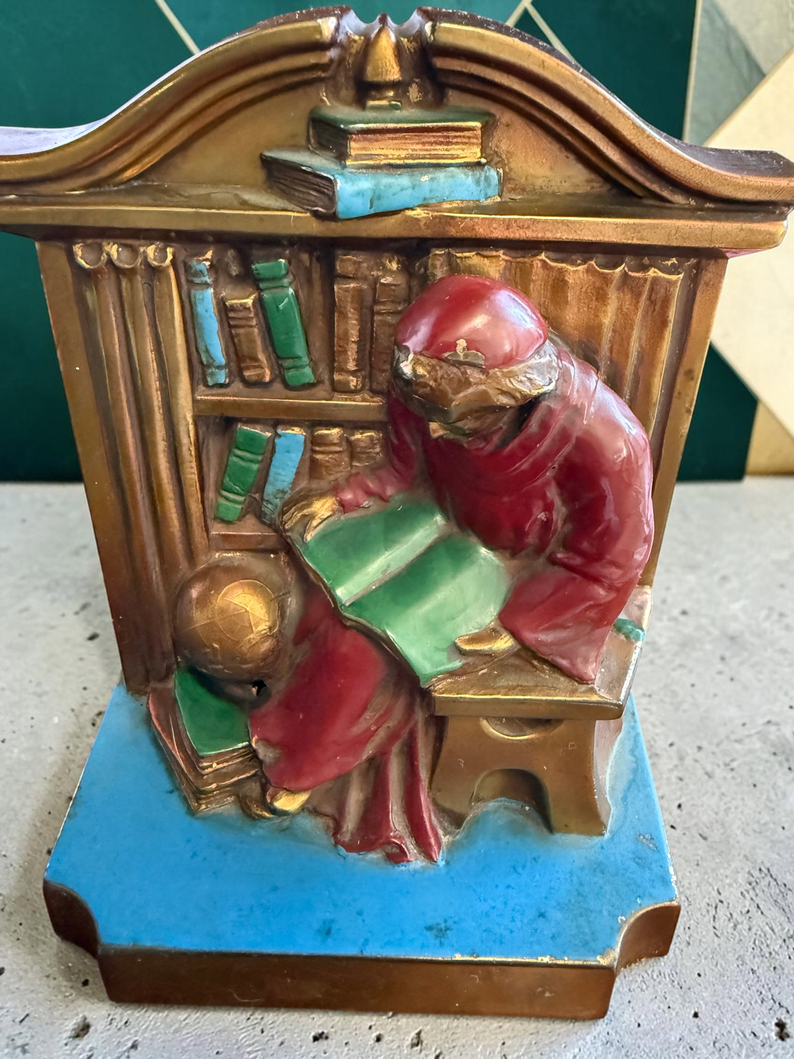 Ronson L.V. Aronson 1922 Reading Monk Library Bookend Art Deco: American polychrome metal library bookend by Louis V. Aronson, bearing the L.V.A. copyright mark and dating to 1922. Aronson’s Art Metal Works later became closely associated with the Ronson name.Th