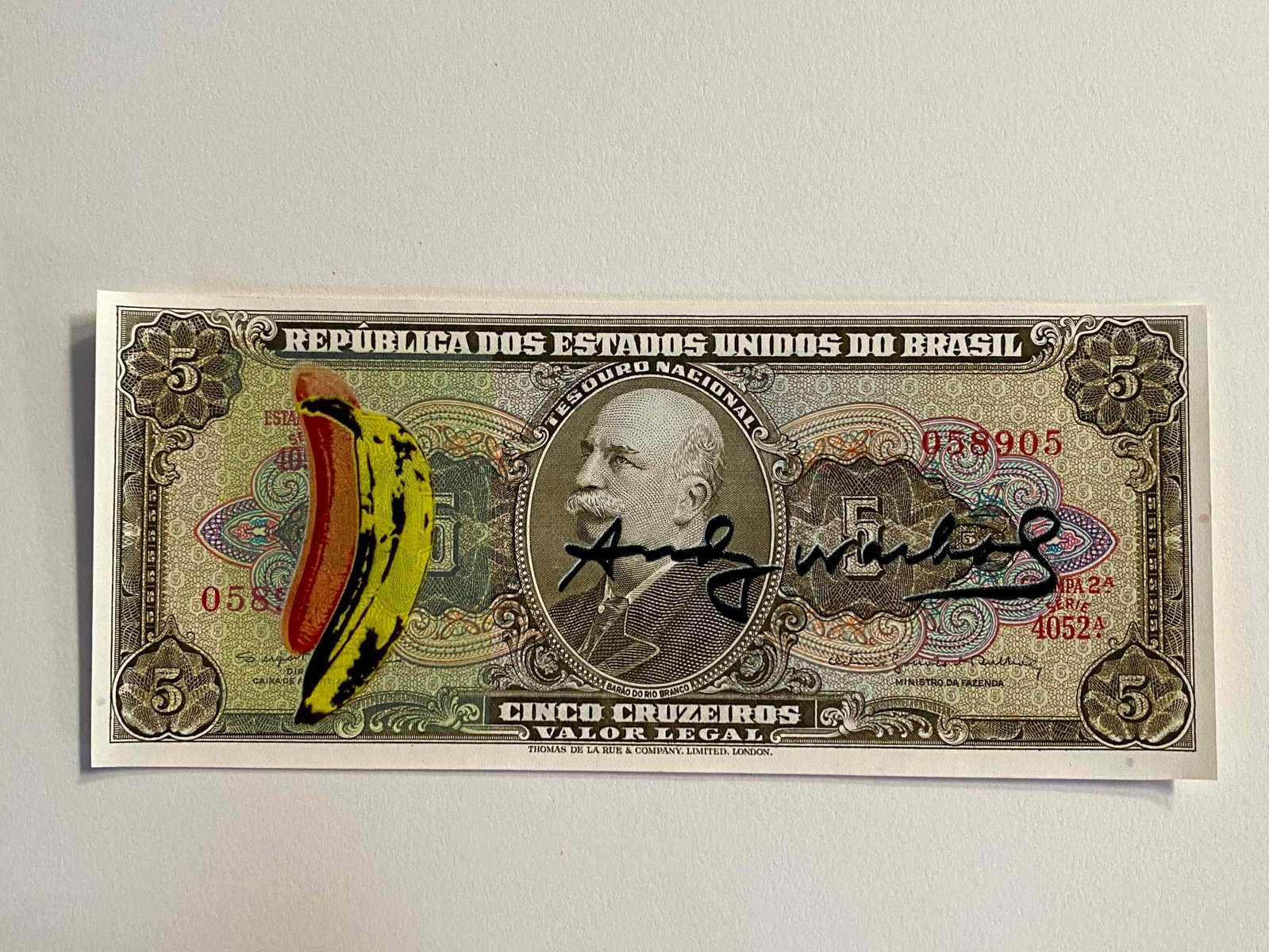 Andy Warhol ( AFTER) silkscreen on banknotes: "AFTER" Andy WarholTitle: Screen-printed banknote "AFTER" Andy Warhol Media: 5 Cruzeiros Brazilian banknote Description: Screen-printed banknote of a work by Andy Warhol. The back features a postmark 