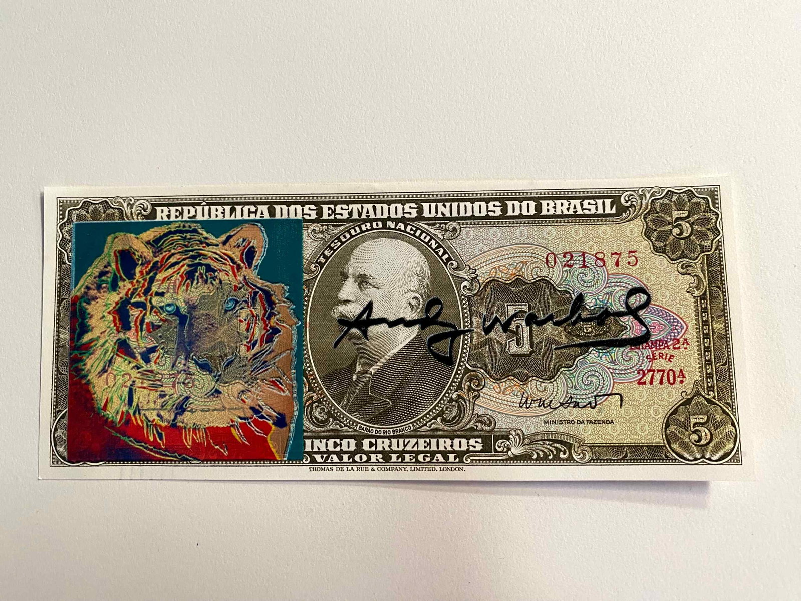 Andy Warhol ( AFTER) silkscreen on banknotes: "AFTER" Andy WarholTitle: Screen-printed banknote "AFTER" Andy Warhol Media: 5 Cruzeiros Brazilian banknote Description: Screen-printed banknote of a work by Andy Warhol. The back features a postmark 