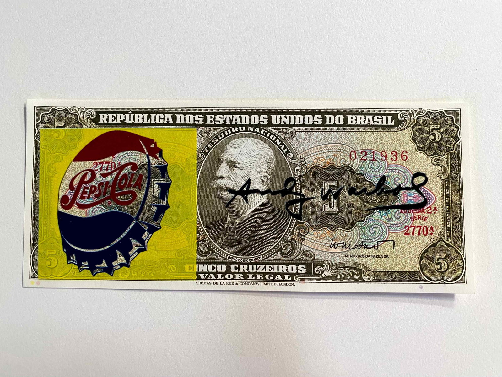 Andy Warhol ( AFTER) silkscreen on banknotes: "AFTER" Andy WarholTitle: Screen-printed banknote "AFTER" Andy Warhol Media: 5 Cruzeiros Brazilian banknote Description: Screen-printed banknote of a work by Andy Warhol. The back features a postmark 