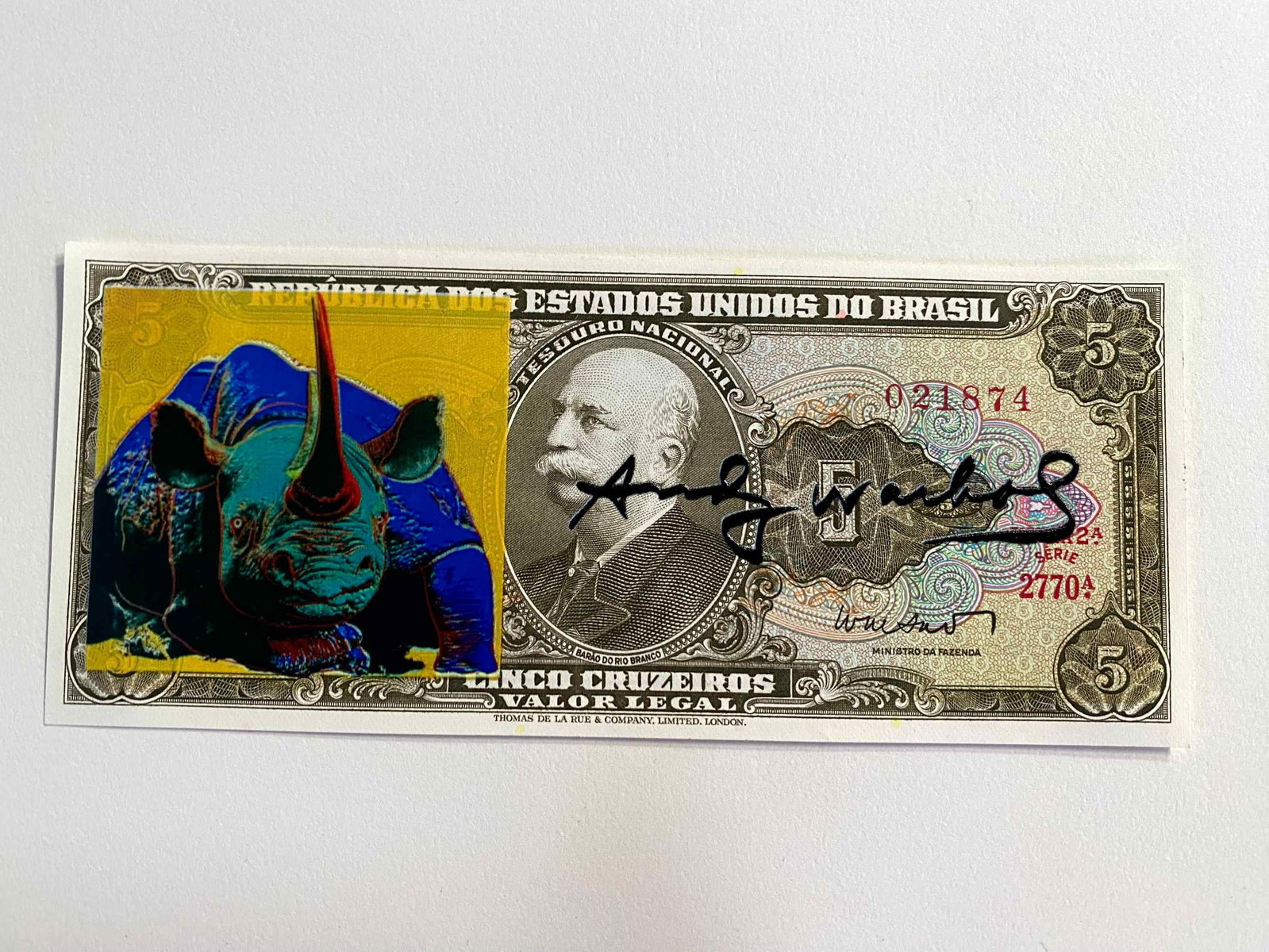 Andy Warhol ( AFTER) silkscreen on banknotes: "AFTER" Andy WarholTitle: Screen-printed banknote "AFTER" Andy Warhol Media: 5 Cruzeiros Brazilian banknote Description: Screen-printed banknote of a work by Andy Warhol. The back features a postmark 