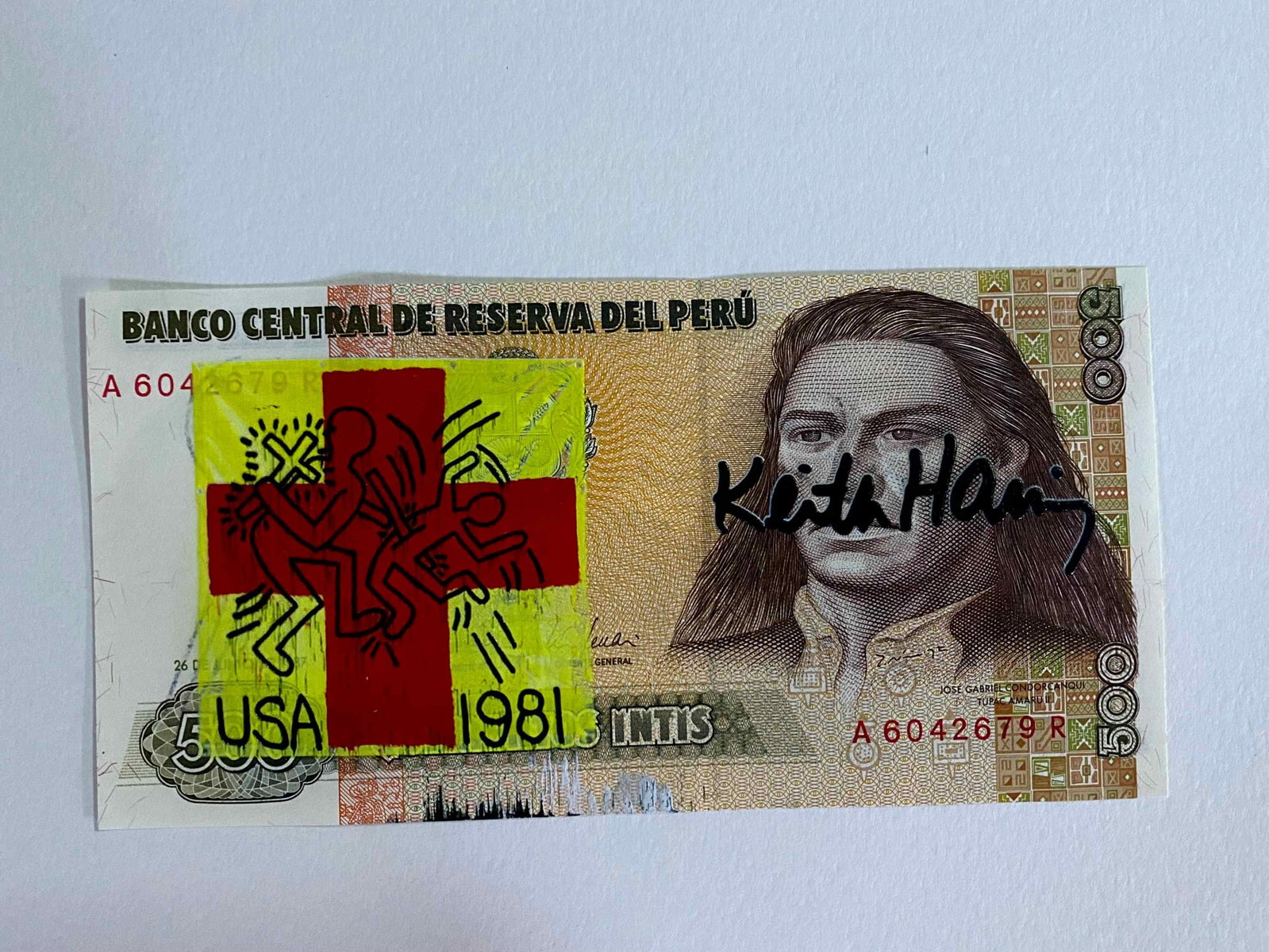 Keith Haring ( AFTER) silkscreen on banknotes: "AFTER" Keith Haring Title: Silkscreened Banknote "AFTER" Keith Haring Material: 500 Reserva Central del Peru Banknote Description: Silkscreened banknote of a work by Keith Haring. The back features a