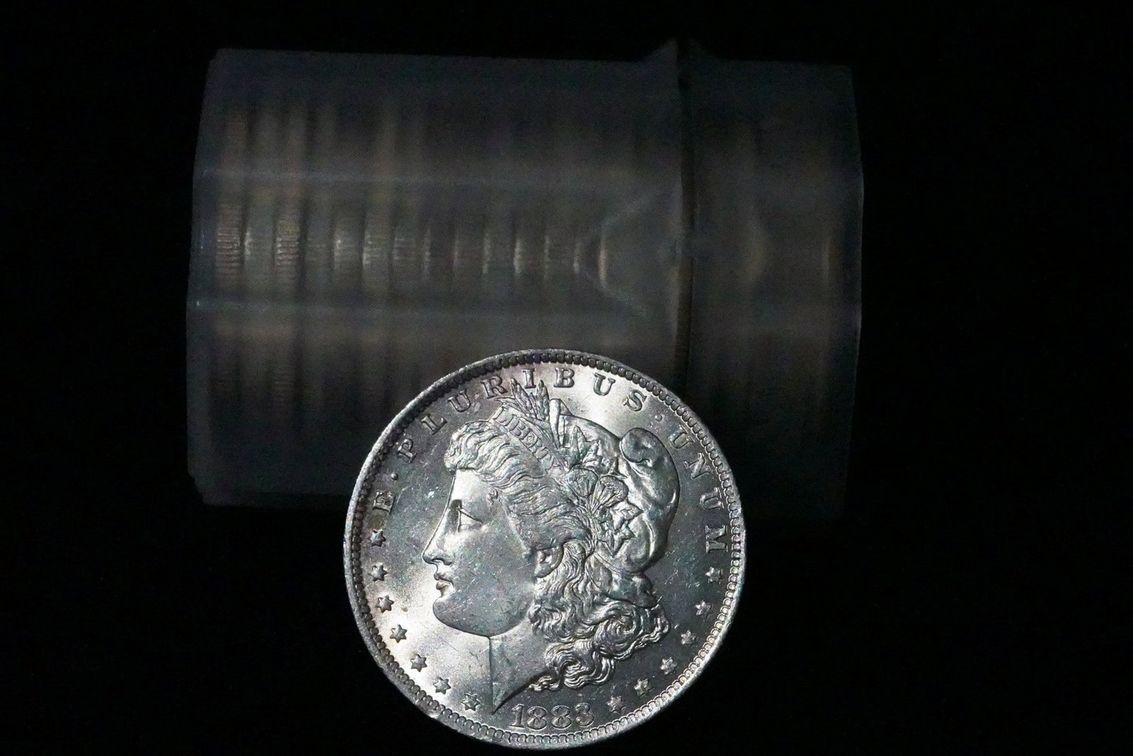 LOT OF 10 MORGAN SILVER DOLLARS AU: THIS LOT CONTAINS 10 MORGAN SILVER DOLLARS IN AU (ABOUT UNCIRCULATED) CONDITION AS STATED. A GROUPING OF CLASSIC U.S. MORGAN SILVER DOLLARS WITH MIXED DATES AND MINT MARKS AS SHOWN. CONDITION AND CONT
