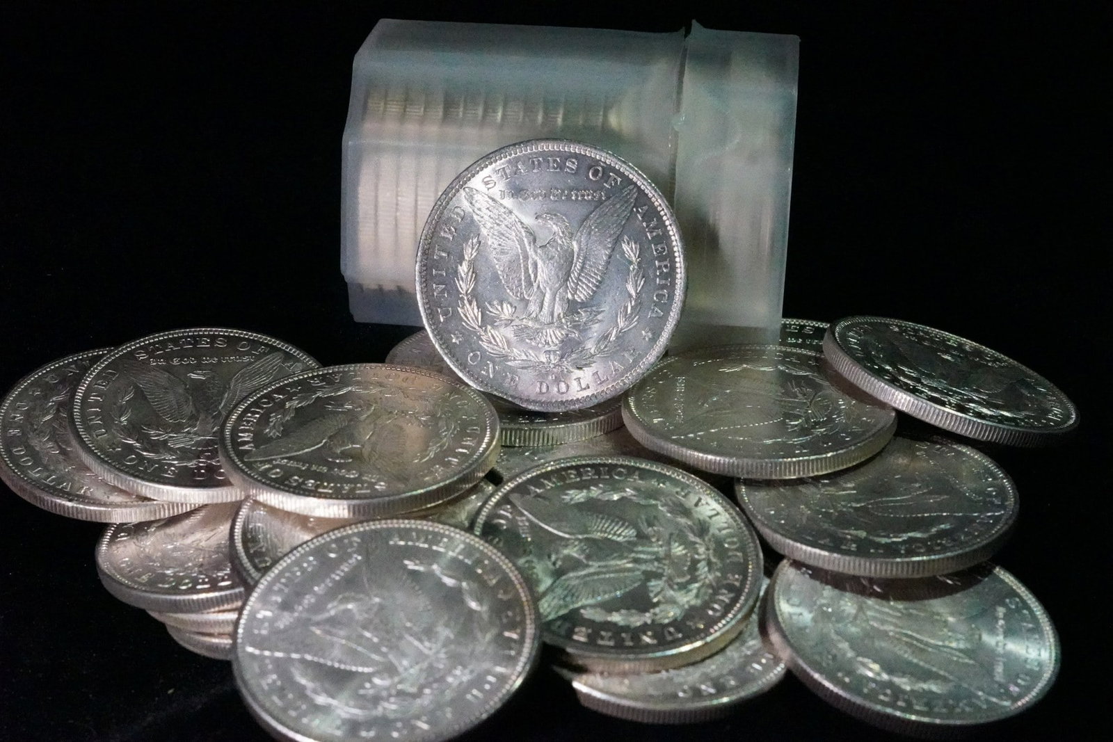 LOT OF 50 "O" MORGAN SILVER DOLLARS BU: THIS LOT CONTAINS 50 "O" (NEW ORLEANS) MINT MORGAN SILVER DOLLARS IN BU CONDITION AS STATED. A DESIRABLE GROUPING OF CLASSIC U.S. MORGAN SILVER DOLLARS WITH NEW ORLEANS MINT MARKS. DATES, MINT MARKS, 