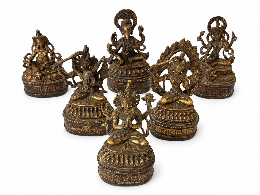 Qing Dynasty, A Group of Six Nepalese-Style Buddhist and Hindu Deity Figures: A finely detailed group of six small Nepalese-style deity figures, attributed by the owner to the early–mid Qing period. The group comprises Manjushri, a figure identified as Manjushri with consort,