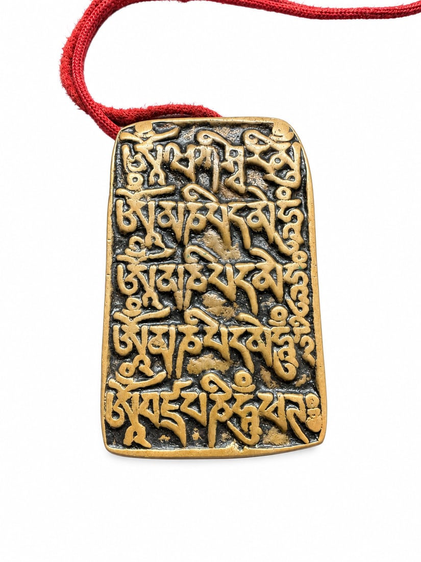 Rare Qing Dynasty Tibetan Six-Syllable Mantra Amulet with Om Ah Hum Reverse: A Tibetan Buddhist Six-Syllable Mantra amulet with raised sacred script on the front and the three seed syllables, Om Ah Hum, arranged vertically on the reverse, symbolizing enlightened body, speech a