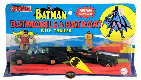 1974 AHI "Batman Batmobile & Bat Boat w/ Trailer": Batman Batmobile & Bat Boat w/ Trailer, 1974, AHI, Hong Kong, 11", plastic friction powered Batmobile w/ Batman & Robin figures towing the Batboat; mint / factory sealed on colorful C9 card (bubble li
