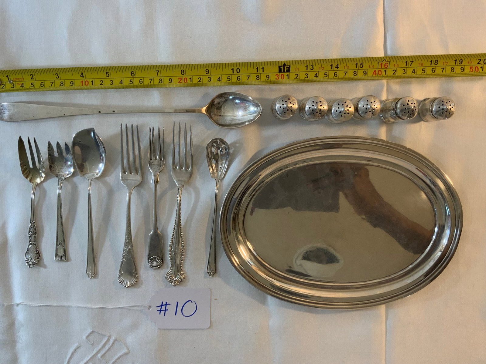 Sterling Lot: Sterling lot, 16.530 oz t, 15 pieces including five forks, three spoons, six miniature salt and pepper shakers, and a tray by International. Good condition.