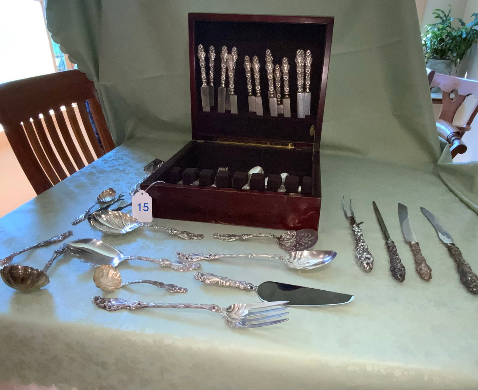 Sterling Flatware Set: Sterling flatware set, Lily pattern by Whiting Manufacturing Co. Large set, 98.619 ounces troy, plus knives and serving pieces. Good condition.