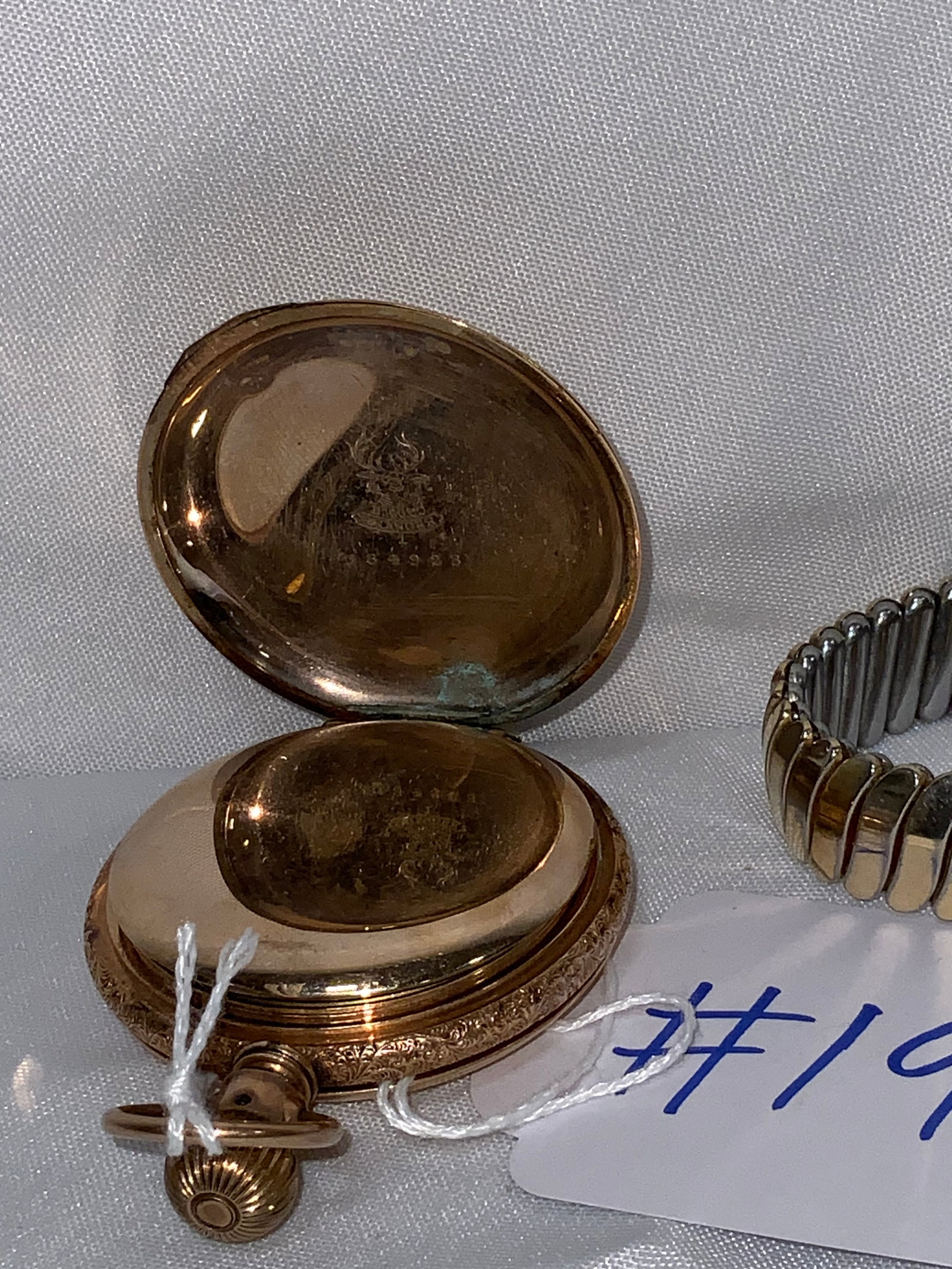 2 Watches: 2 watches: 1st Elgin National Watch Co. pocket watch number 4721085, works number 84923, hunter case, Granger B.W.C. Co., missing the crystal, fair condition. 2nd Hamilton men's wristwatch, 17 jewel,