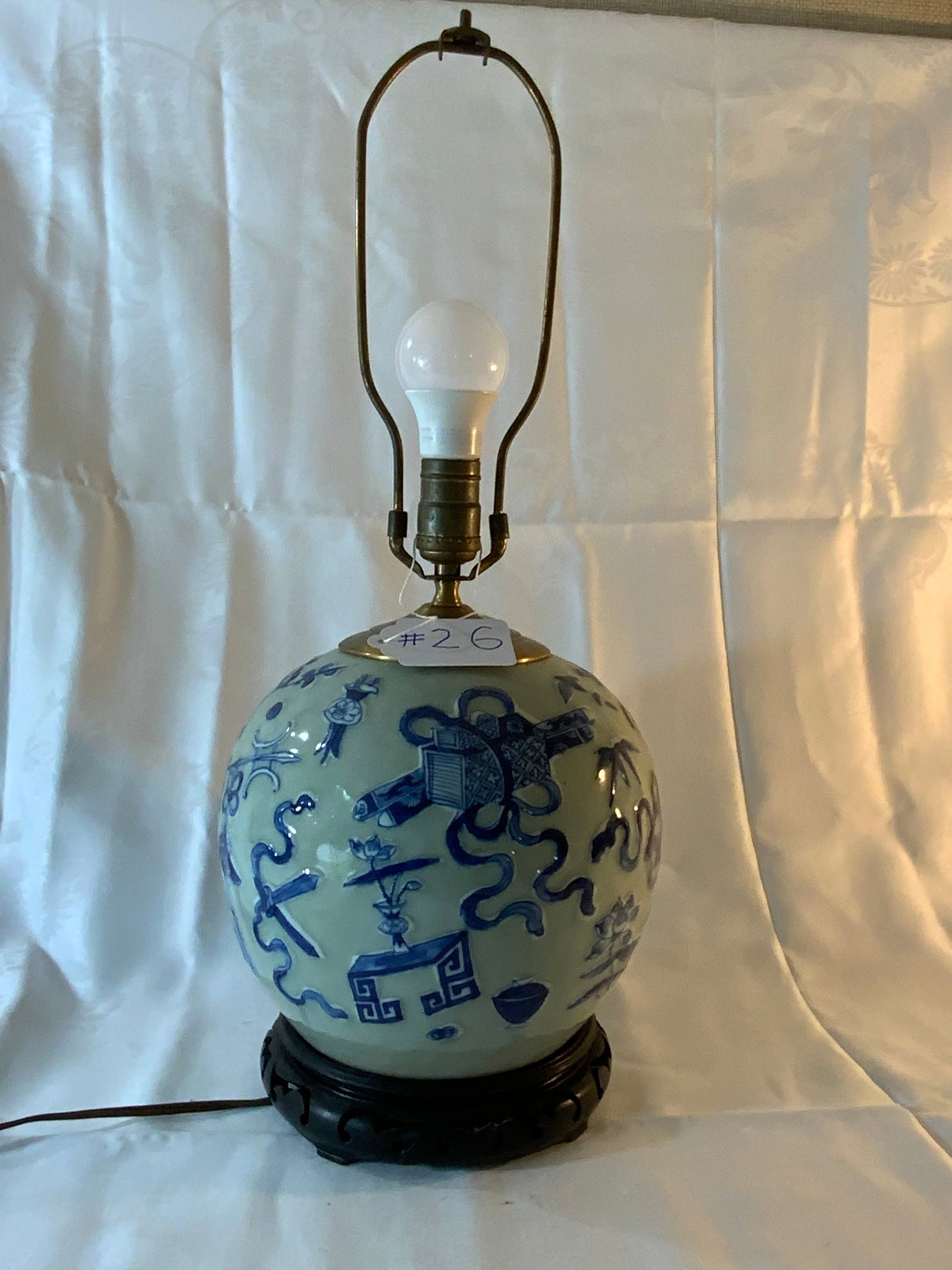 Oriental Lamp: Oriental lamp with raised blue pattern, 8 inches wide x 10 inches tall. Good condition.