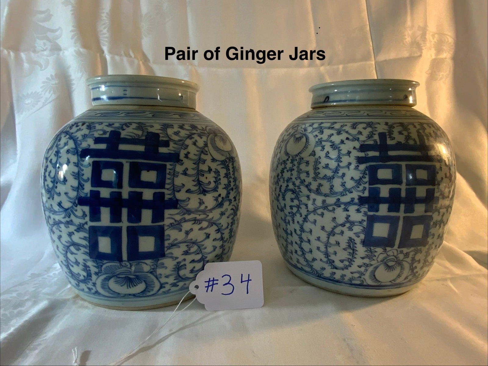 Oriental Ginger Jars: Oriental pair of ginger jars with lids, 8 inches wide by 9 inches tall. Good condition.