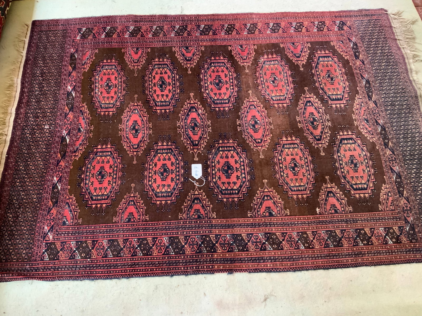 Oriental Bakhara Carpet: Oriental Bakhara carpet, size to be added day of auction. Good condition.