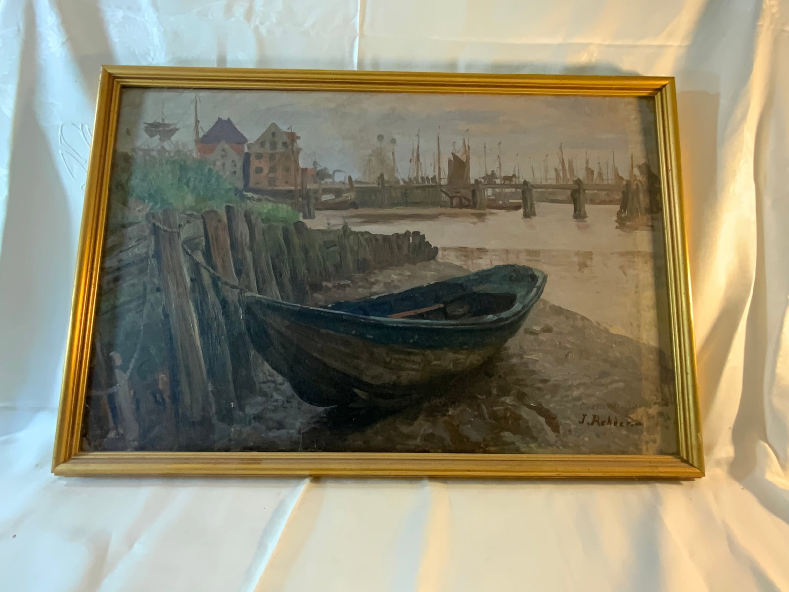 Julius Christian Rehder Painting: Painting by Julius Christian Rehder, harbor scene with row boat, oil on canvas in gold frame, 25" wide by 16 1/2" tall, signed lower left, inscribed Cuxhaven Hamburg. Good condition.