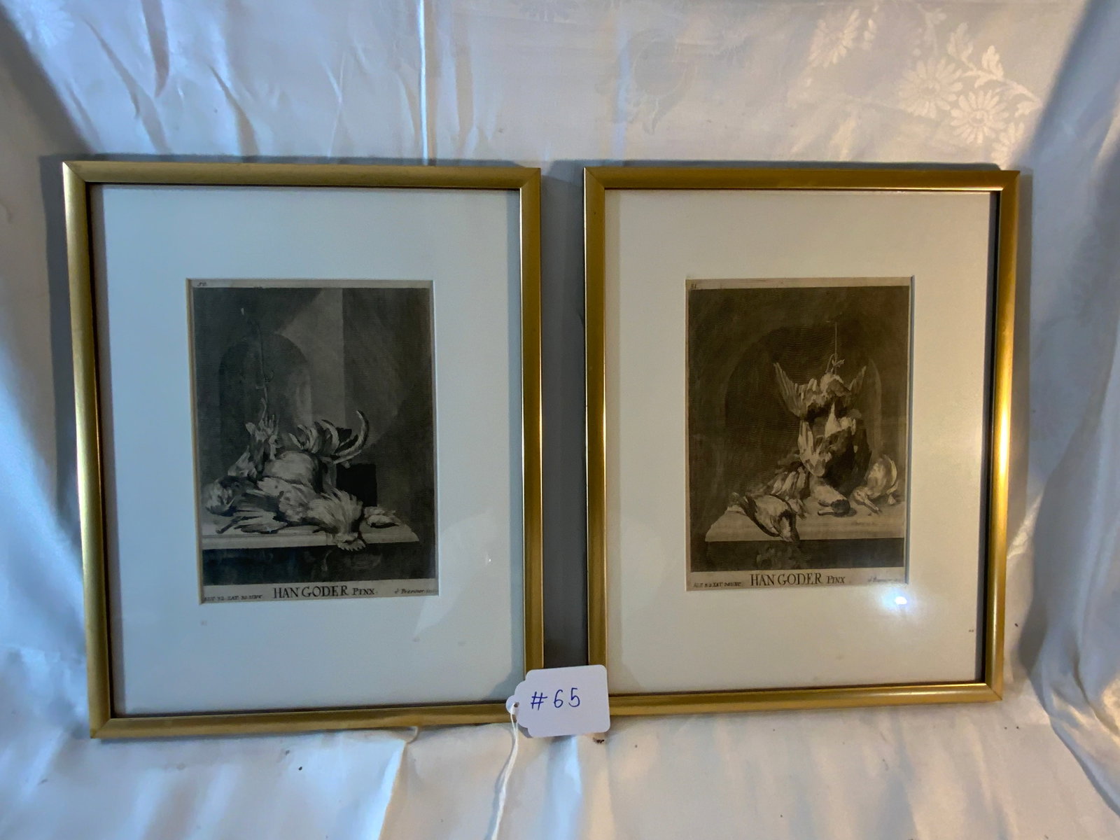 Hangorden Etchings: 2 framed etchings of hanging game, signed Hangorden Pinx, large matting, gold framed. Good condition.