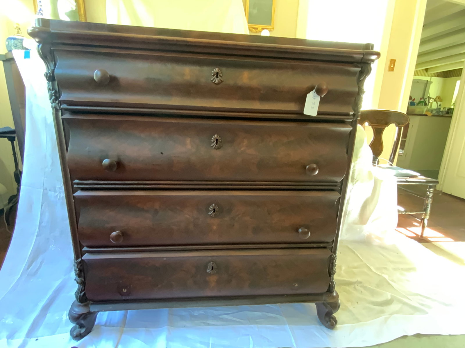 Rococo Style Chest: Chest, Rococo style, four drawer, mahogany, carved corners, turned foot, missing two wooden pulls. Good overall condition.