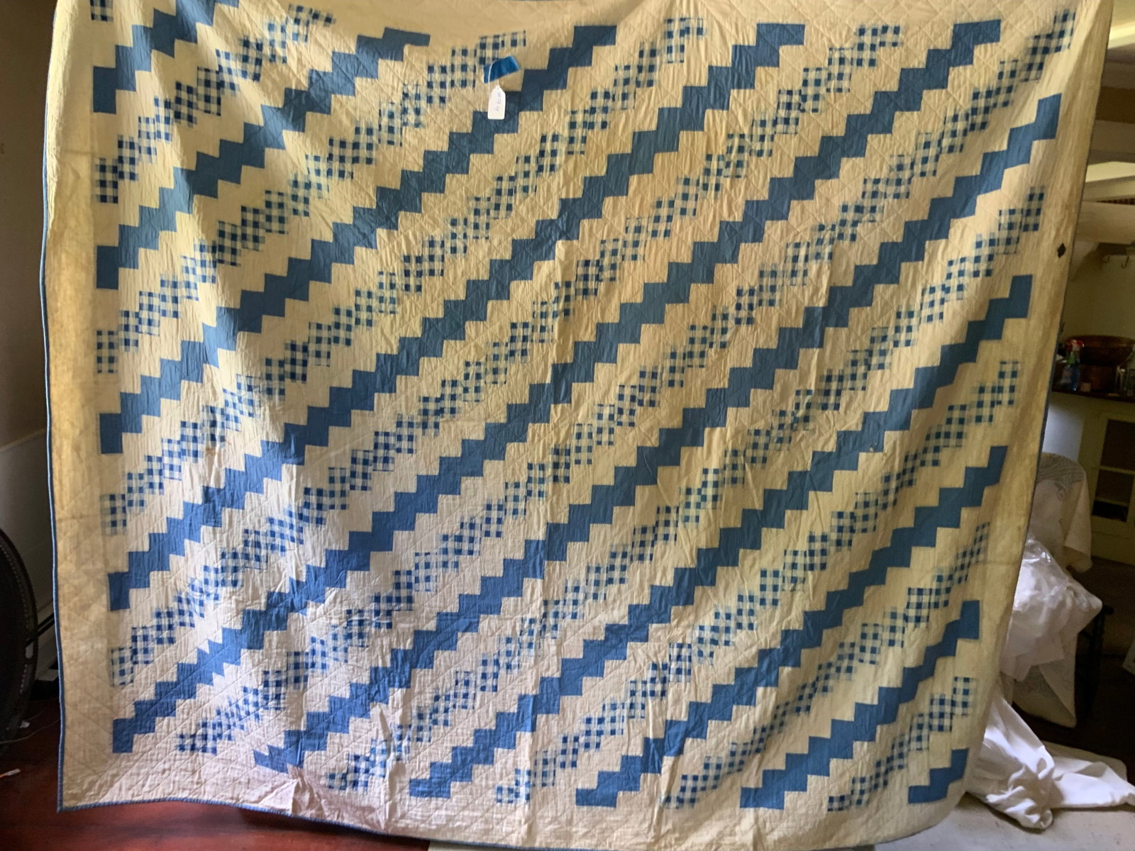 Amish Quilt: Quilt, turquoise blue & white, 98" x 89", a few stains, a small hole, and normal wear. Fair condition. Noted as from the Amish community and Wisconsin Mennonites.