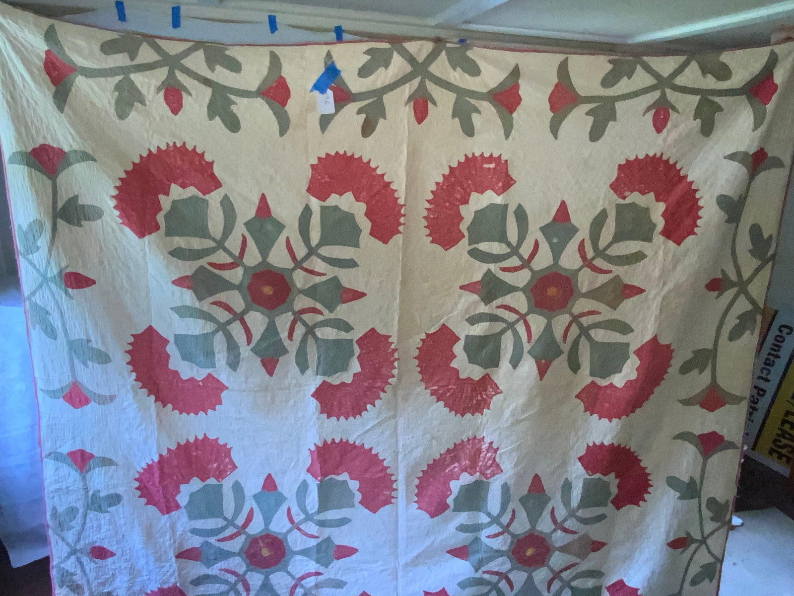 Amish Quilt: Amish quilt, red & green, cream background, 79" x 89", normal wear, small holes. Fair condition.