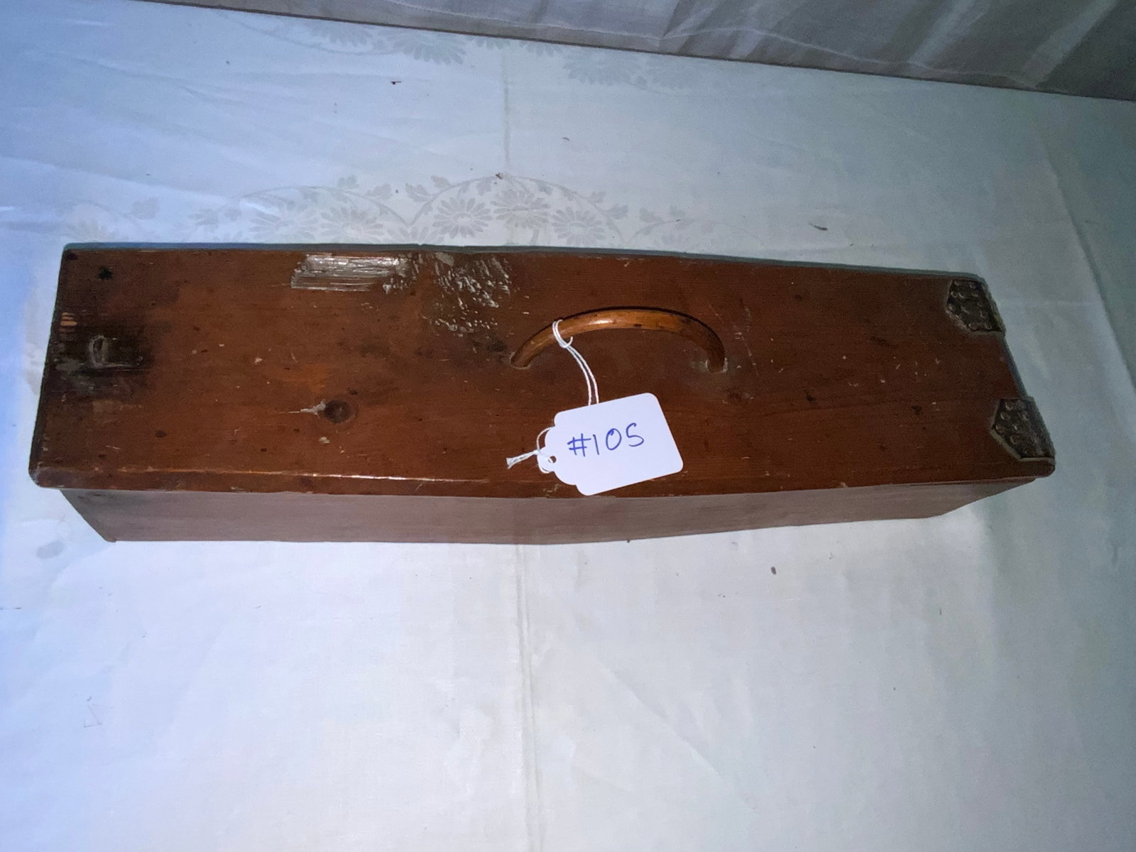 Spruce Storage Box: Spruce storage box, Scandinavia, unusual shape, leather hinges, bow handle on top, 20 1/2 inches long, 5 3/4 inches wide, 4 inches tall. Good condition.