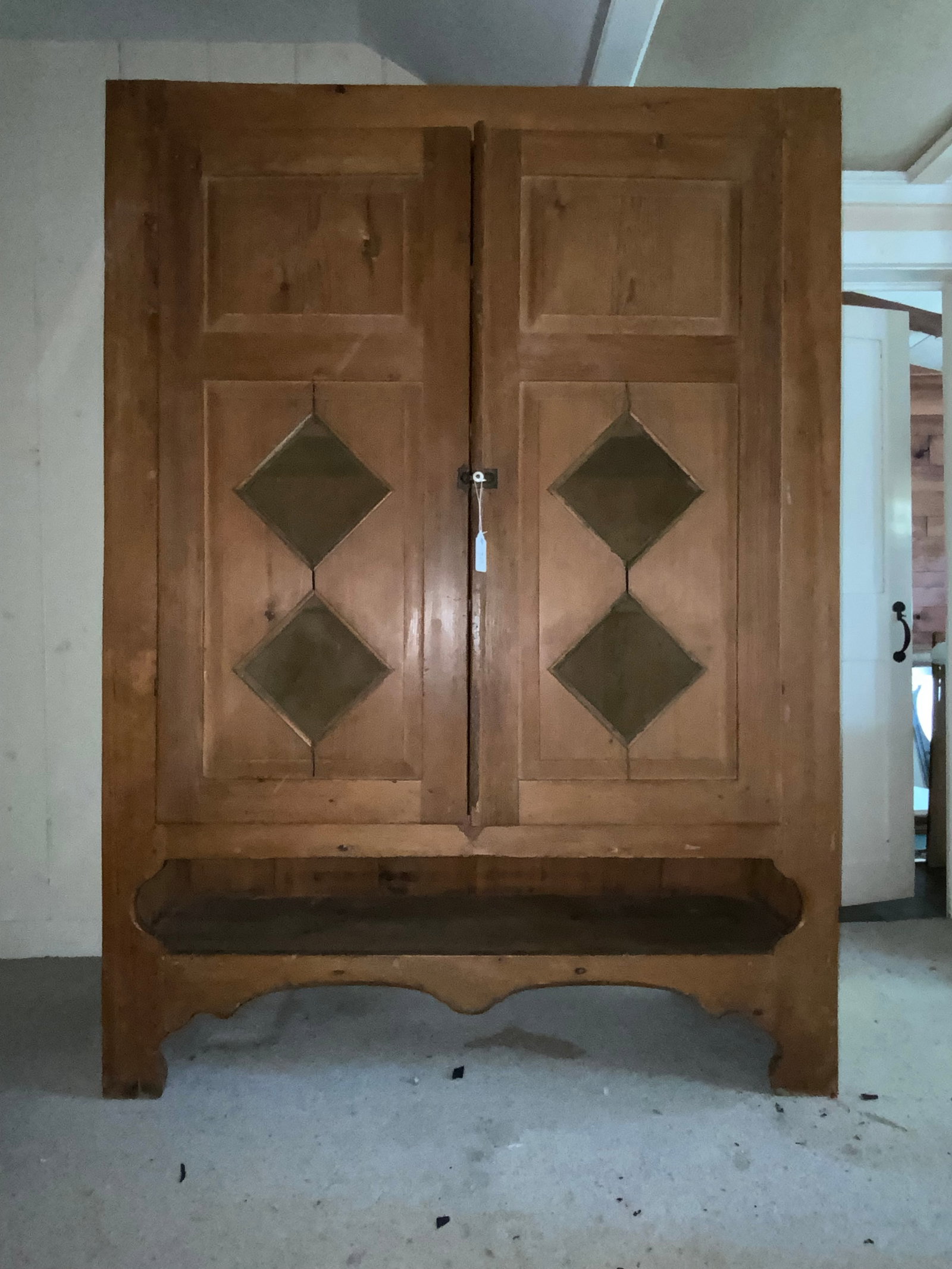 Pie Safe: Pie safe, midwest style, possibly Norwegian cabinet maker, diamond cutouts on front doors with screen, raised panels, unusual bracket base, open bottom shelf, all blue paint on the back, 52 inches