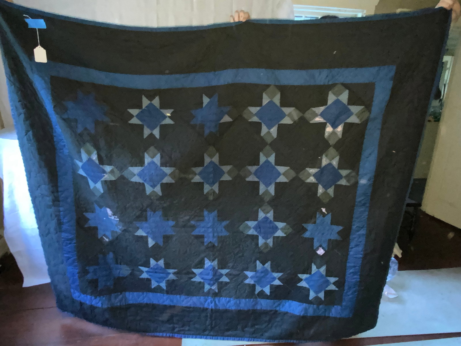 Amish Quilt: Amish quilt, blue and black, 68" x 83", usual wear, has some holes. Fair condition.