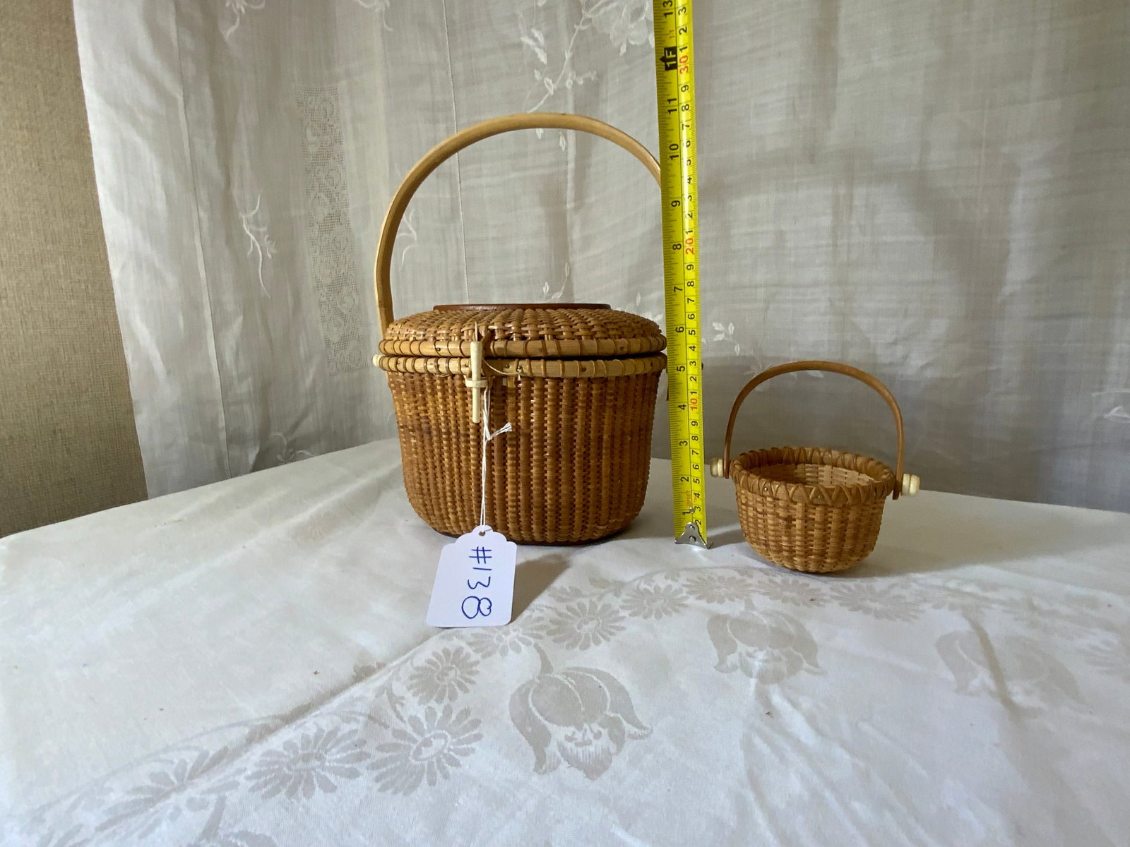 Nantucket Pocket Book & Basket: Nantucket oval pocket book w/ bone mount & miniature basket, both with swing handles, not antique but high-quality. Good condition.
