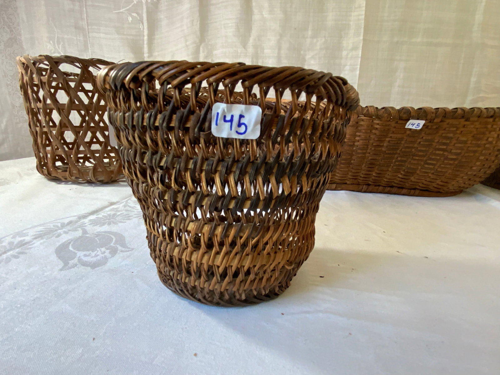 Baskets: Grouping of 7 baskets, open style, variety of age, some minor condition issues.