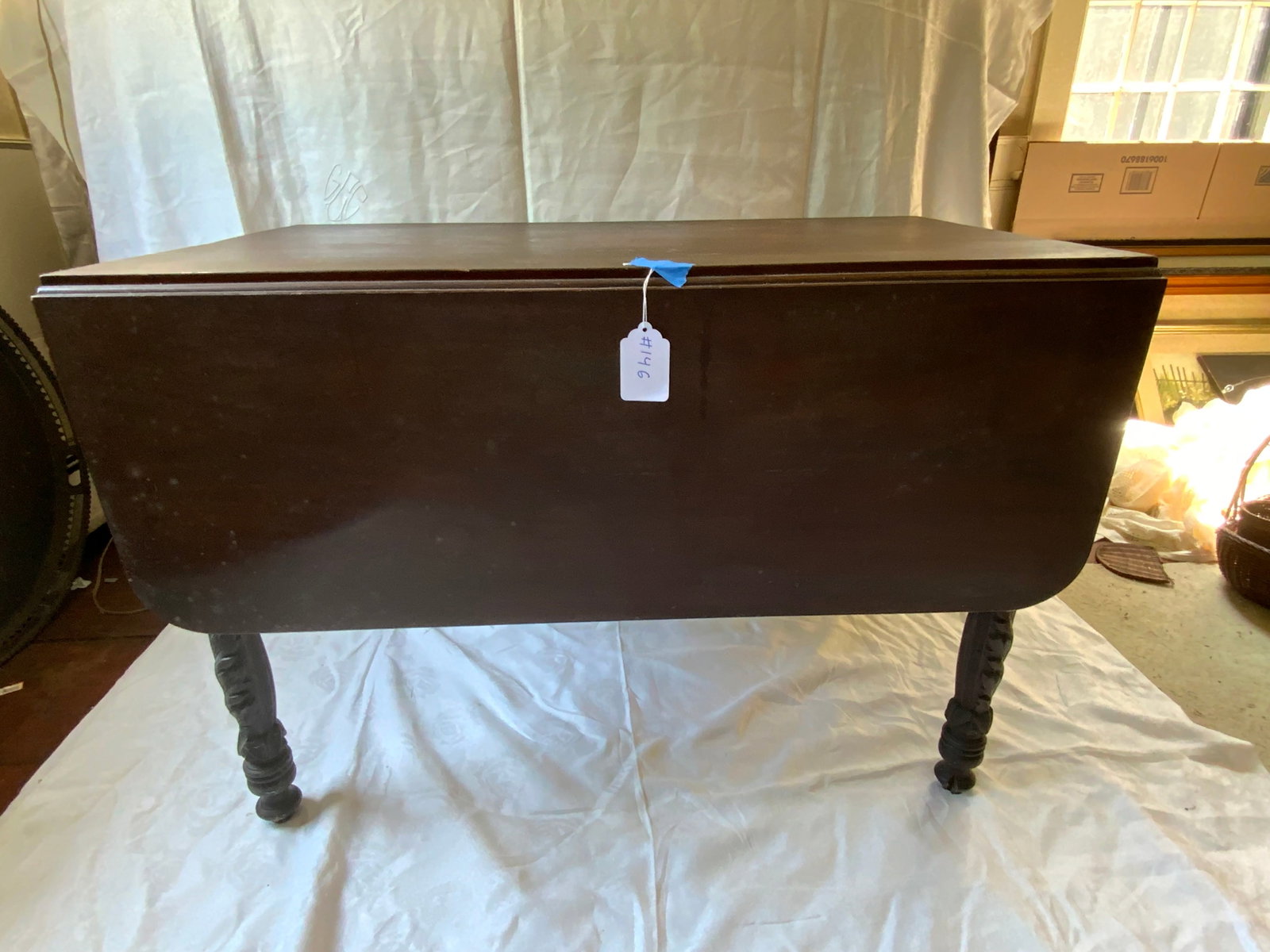 Federal Drop Leaf Table: Drop leaf table, Federal w/ acanthus carved legs, 26" tall, 39" x 49 1/2" open, 39" x 22" closed, some minor veneer damage on skirt, normal wear on an early finish. Good condition.