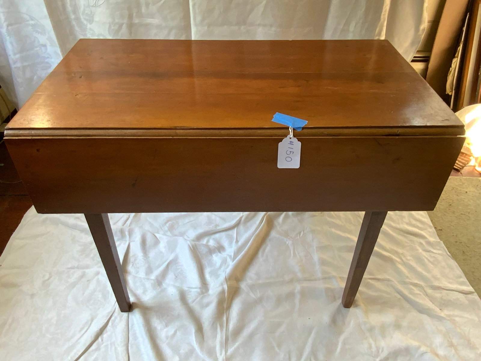 Federal Pembroke Table: Federal Pembroke cherry table w/ 1 drawer, tapered legs, early dovetailing, 26 inches tall, 35" x 18 1/2" closed, 35" x 34 1/2" open. Good condition.