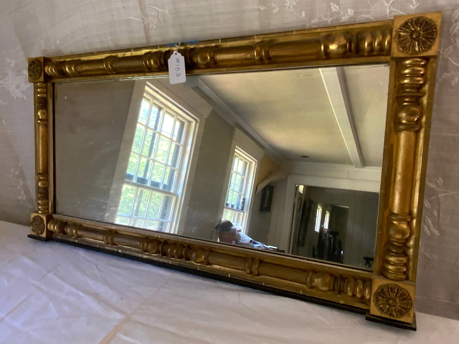 Federal Over-the-Mantle Mirror: Federal over-the-mantle mirror, split baluster mirror, 4 rosettes on corners, 41" wide x 22". Good condition.
