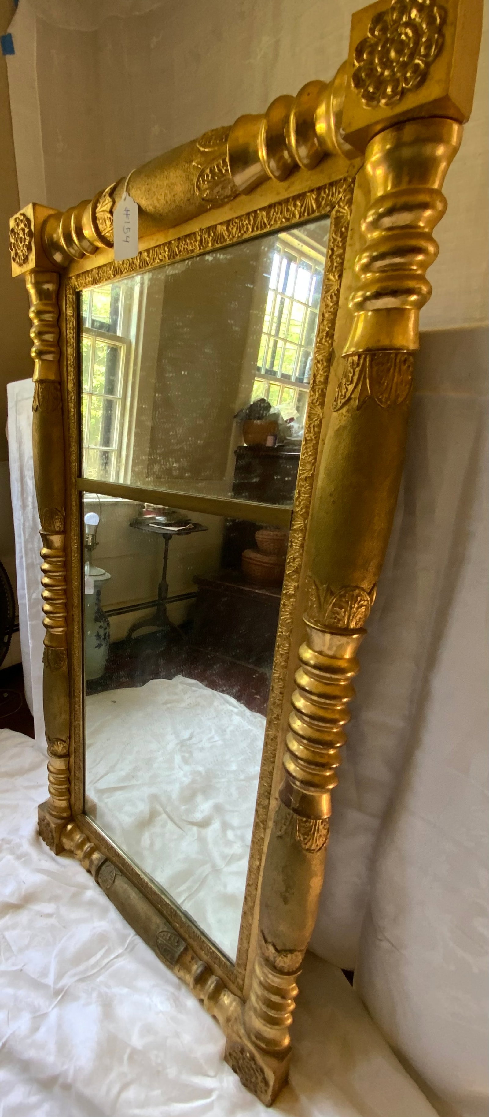 Federal Mirror: Federal mirror, 2-part, split baluster, 4 rosettes in corners, 27" wide x 52" tall. Good condition.