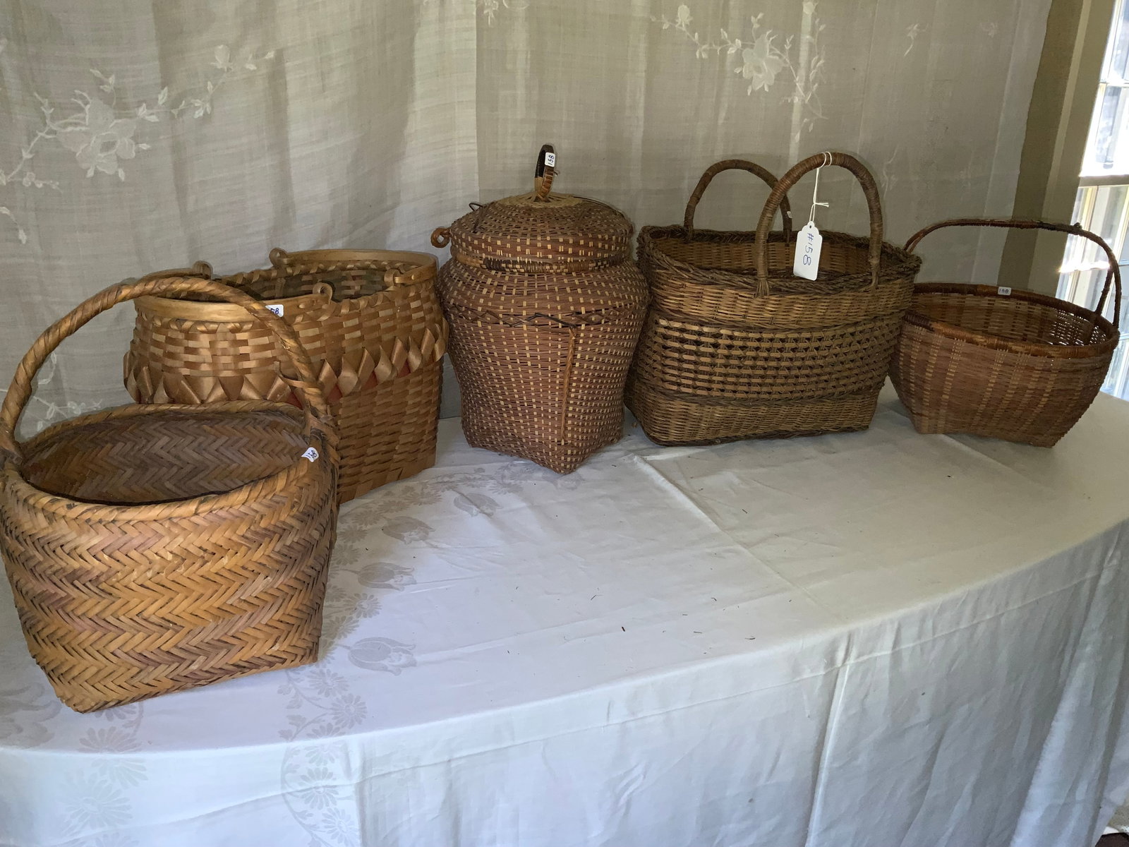 Baskets: Grouping of 5 baskets, variety of ages. Overall good condition.