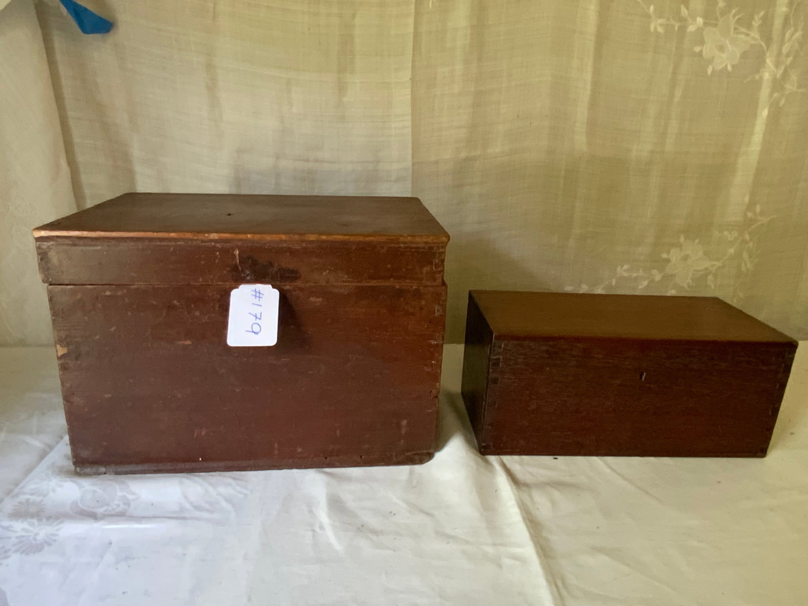 Document Boxes: 2 document boxes, old finish: 1st dovetailed box with a drawer, 15 1/4" x 10 1/4" x 10" tall; 2nd dovetailed lift top, 13 1/4" x 15 1/2" x 6" tall. Good condition.