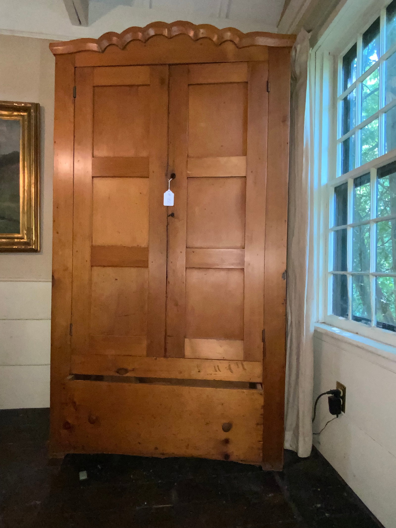 Pine Wardrobe: 2-door pine wardrobe w/ 2 doors & 1 large drawer in base, scalloped top, 42" wide, 78" tall, 19" deep, refinished years ago, one small outlet-size hole cut into the back. Overall good condition.