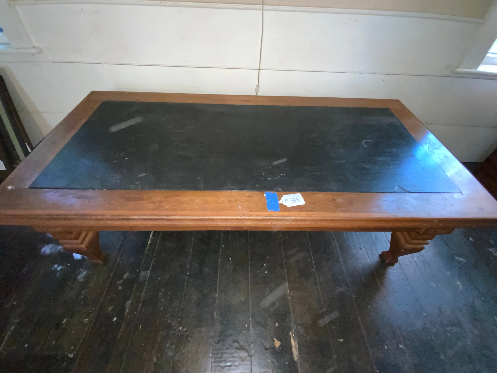 Renaissance Revival Coffee Table: Old coffee table w/ slate top, Renaissance Revival legs & construction, 60" long, 29" wide, 19" tall - started life as a different type of table and was cut down/adapted. Fair condition.